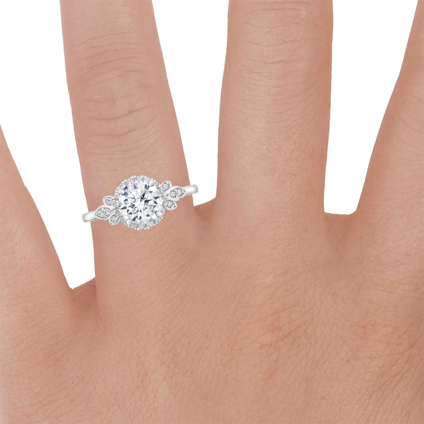 18K White Gold Fiore Halo Diamond Ring (1/6 ct. tw.), large zoomed in top view on a hand