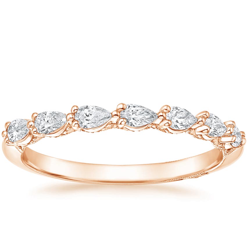 Rose gold diamond engagement ring with surprise diamond details