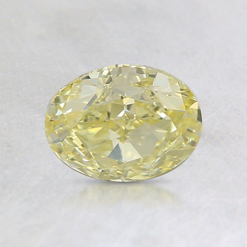 0.91 Ct. Fancy Intense Yellow Oval Diamond