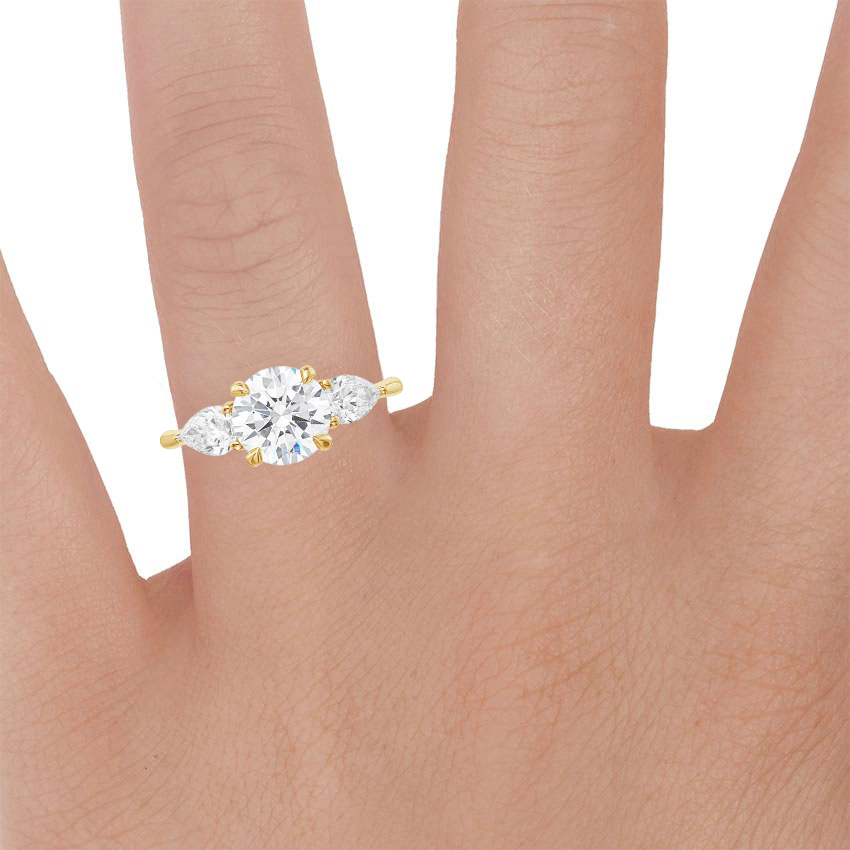 18K Yellow Gold Luxe Opera Three Stone Diamond Ring, large zoomed in top view on a hand