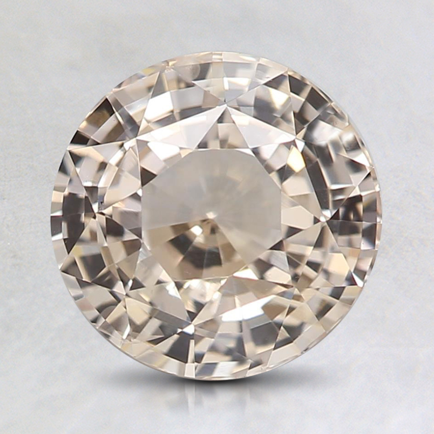 7.7mm Unheated Peach Round Sapphire