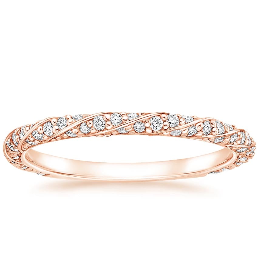 Rose gold diamond engagement ring with surprise diamond details