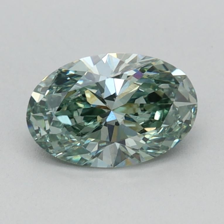 0.61 Ct. Fancy Vivid Bluish Green Oval Lab Grown Diamond