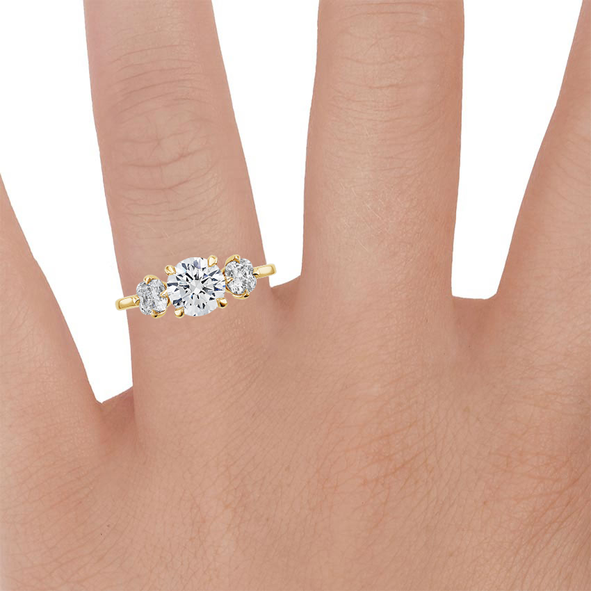 18K Yellow Gold Three Stone Cushion Diamond Ring (2/3 ct. tw.), large zoomed in top view on a hand