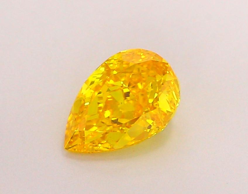 1.03 Ct. Fancy Vivid Orangy Yellow Pear Lab Grown Diamond