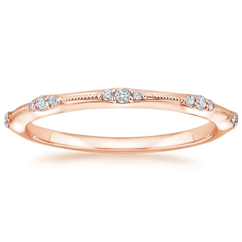 Rose gold diamond engagement ring with surprise diamond details