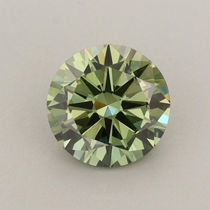 0.68 Ct. Fancy Vivid  Green Round Lab Grown Diamond