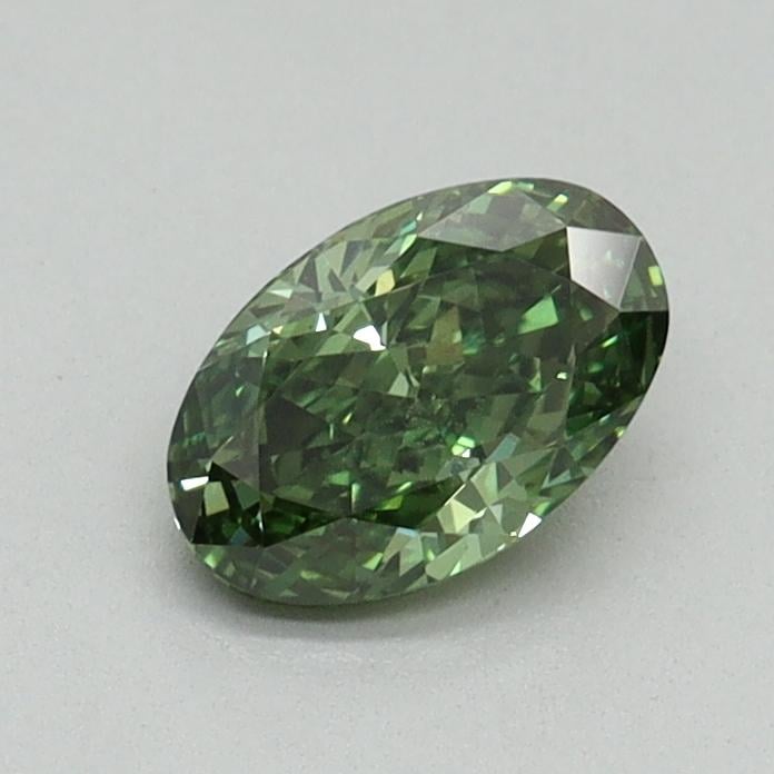 0.59 Ct. Fancy Vivid Green Oval Lab Grown Diamond