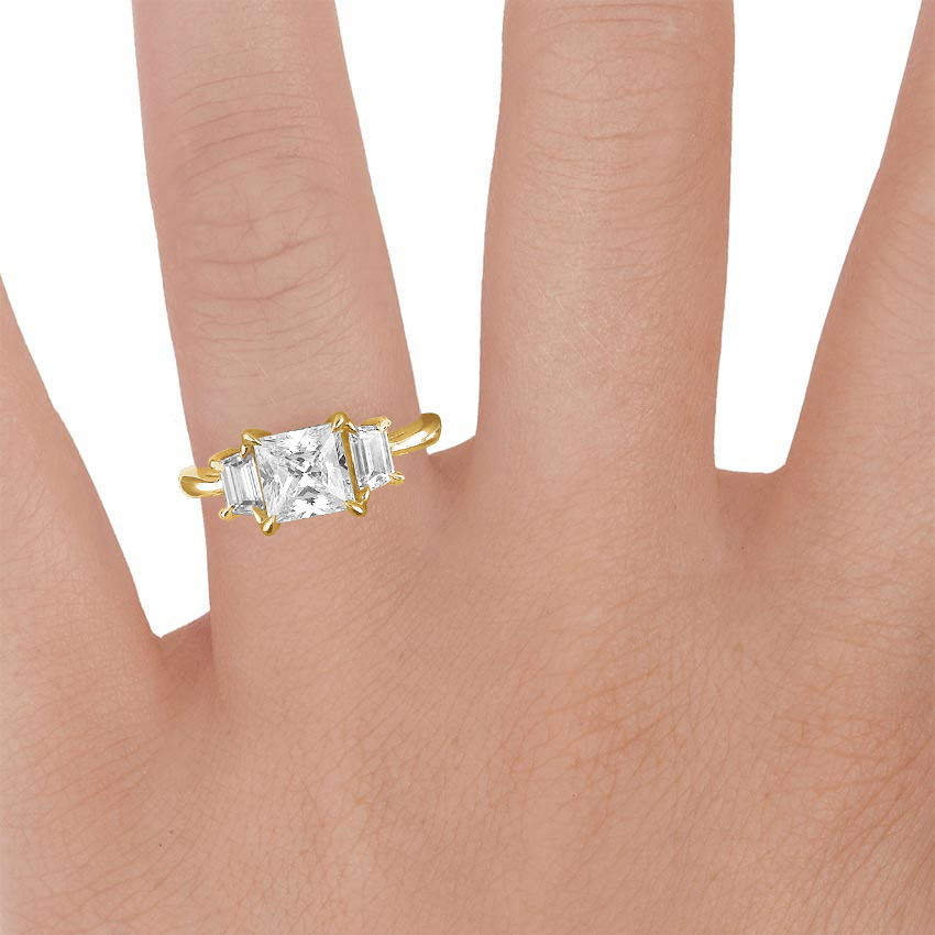 18K Yellow Gold Embrace Three Stone Diamond Ring, large zoomed in top view on a hand