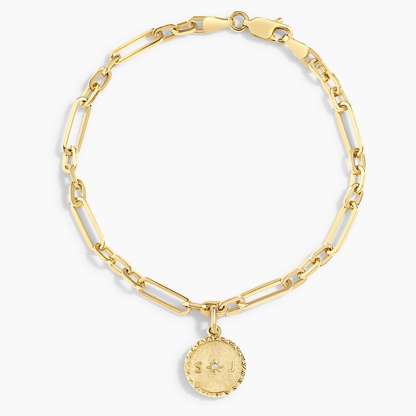 Lot - 14K gold large fancy chain link bracelet with antique photo charm.  Bracelet marked Unoaerri, 14K, Italy. 7in length. Charm with strap clasps  holding accordion-fold-out sections. Inscribed and dated 1894-1919. 38.1