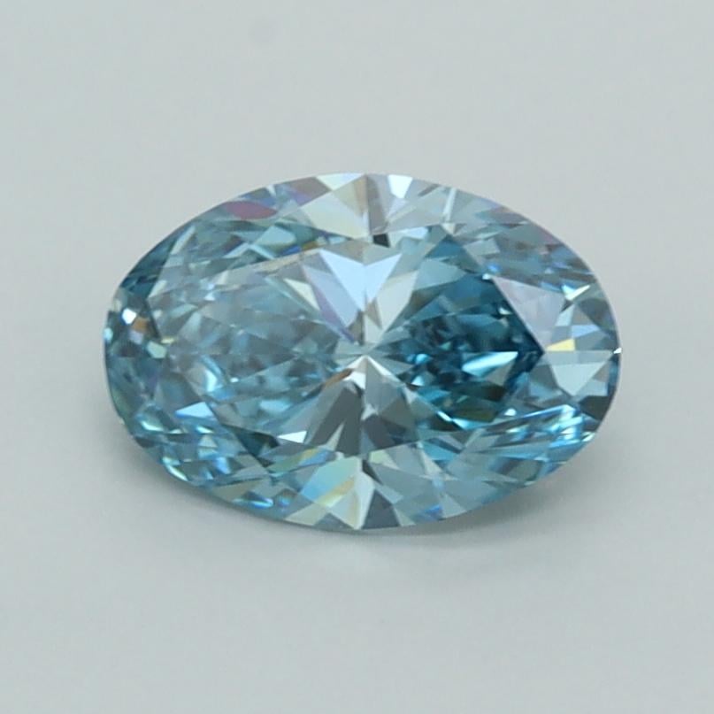 0.99 Ct. Fancy Vivid Greenish Blue Oval Lab Grown Diamond