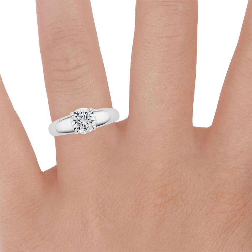 18K White Gold Adrian Solitaire Ring, large zoomed in top view on a hand