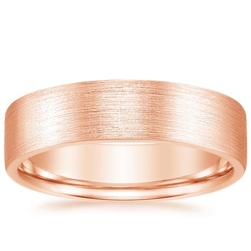 Rose gold diamond engagement ring with surprise diamond details