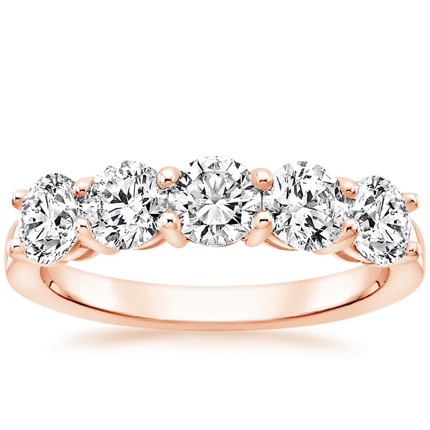 Rose gold diamond engagement ring with surprise diamond details