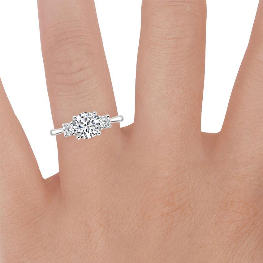 Platinum Selene Three Stone Diamond Ring (1/3 ct. tw.), large zoomed in top view on a hand