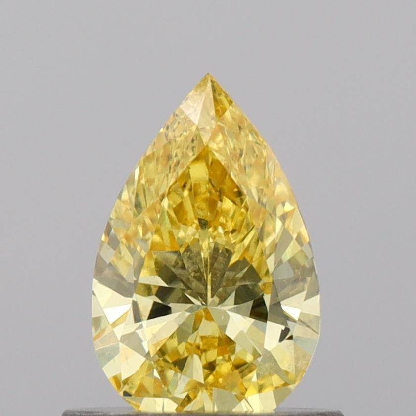 0.63 Ct. Fancy Vivid Yellow Pear Lab Grown Diamond
