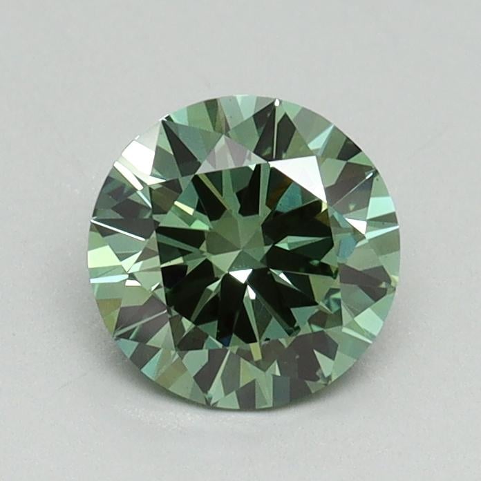 0.81 Ct. Fancy Vivid Pacific Green Round Lab Grown Diamond