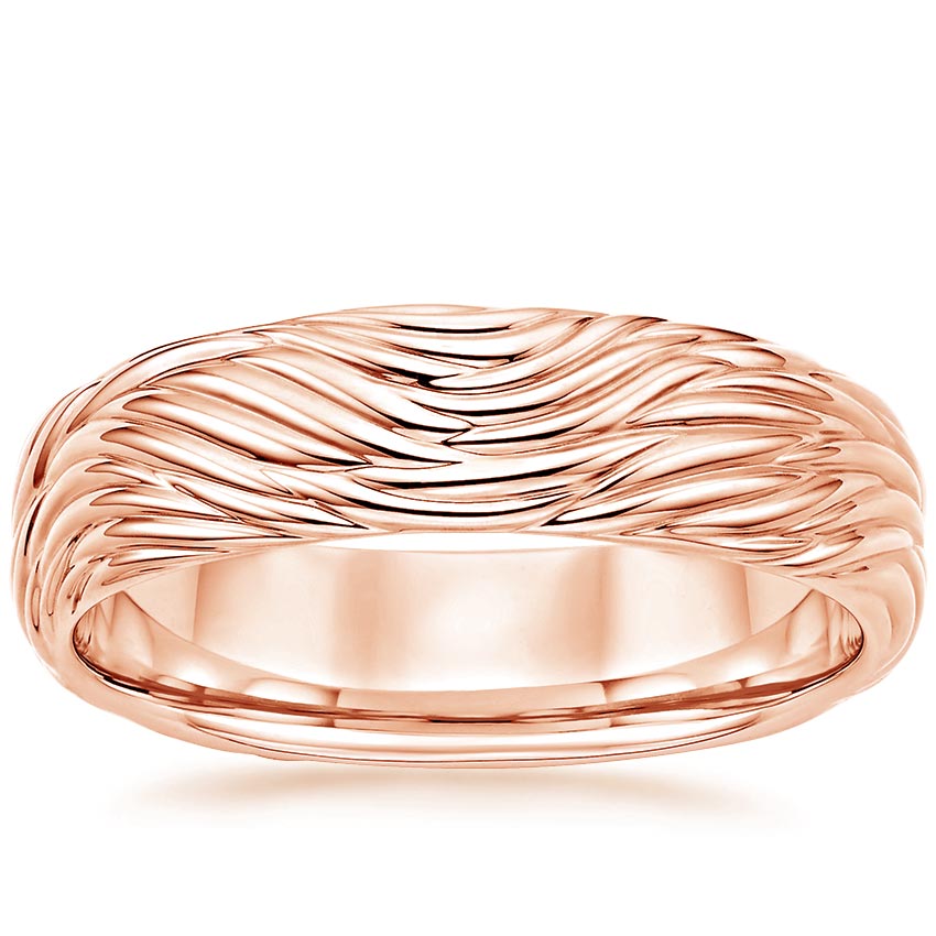 Rose gold diamond engagement ring with surprise diamond details