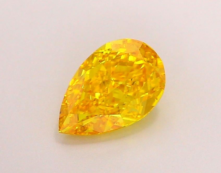 1.06 Ct. Fancy Vivid Orangy Yellow Pear Lab Grown Diamond