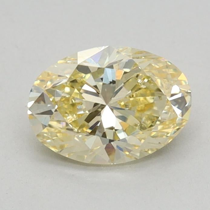 0.62 Ct. Fancy Yellow Oval Lab Grown Diamond