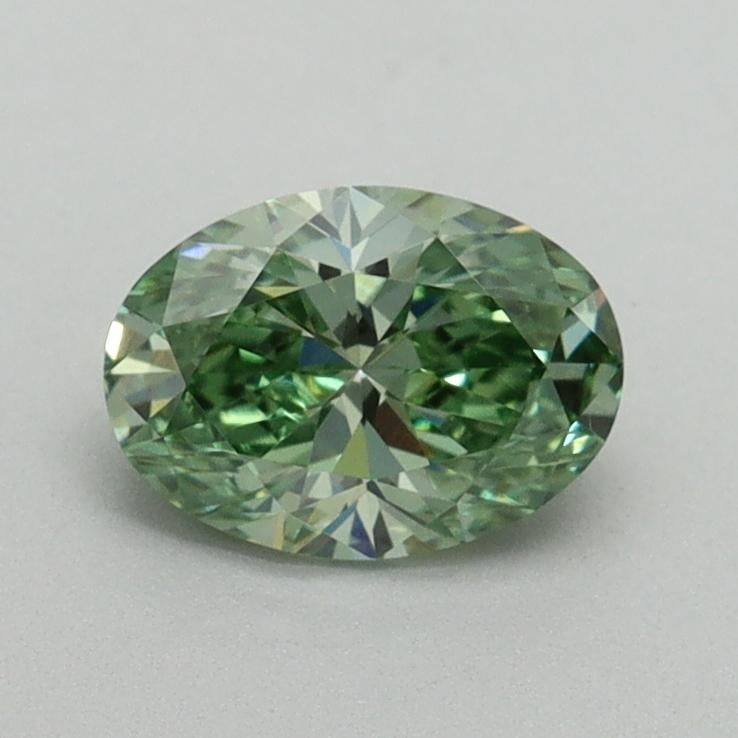 0.74 Ct. Fancy Vivid Pacific Green Oval Lab Grown Diamond
