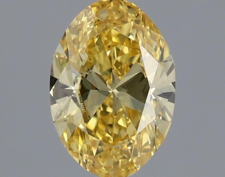 0.57 Ct. Fancy Vivid Yellow Oval Lab Grown Diamond