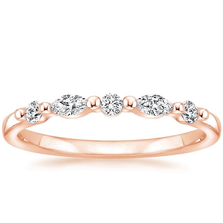 Rose gold diamond engagement ring with surprise diamond details