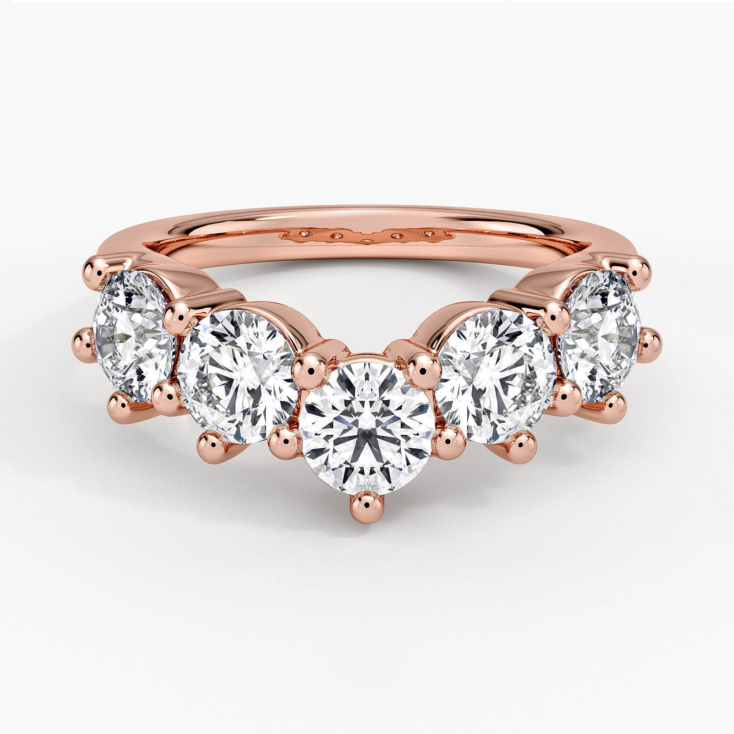 Rose gold diamond engagement ring with surprise diamond details