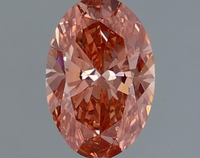 1.07 Ct. Fancy Vivid Orangy Pink Oval Lab Grown Diamond