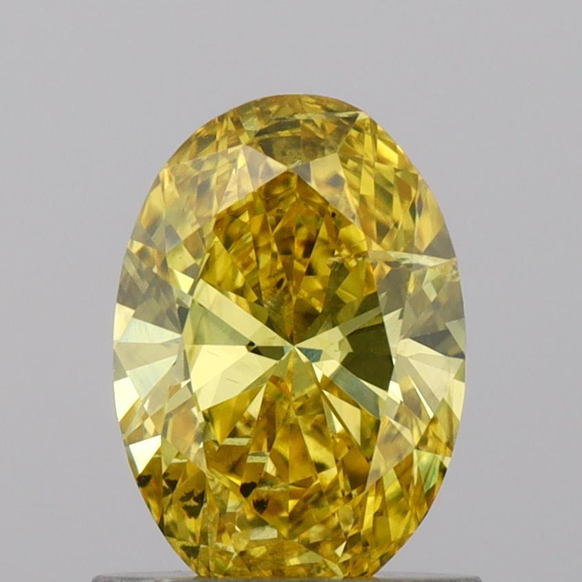 0.88 Ct. Fancy Vivid Yellow Oval Lab Grown Diamond