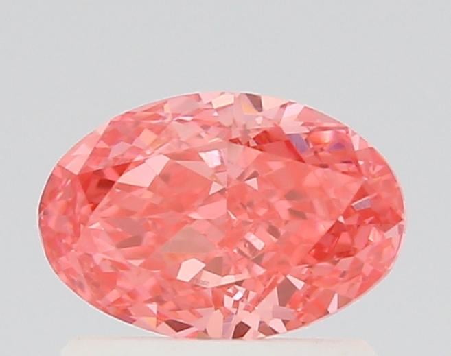 0.77 Ct. Fancy Vivid Pink Oval Lab Grown Diamond