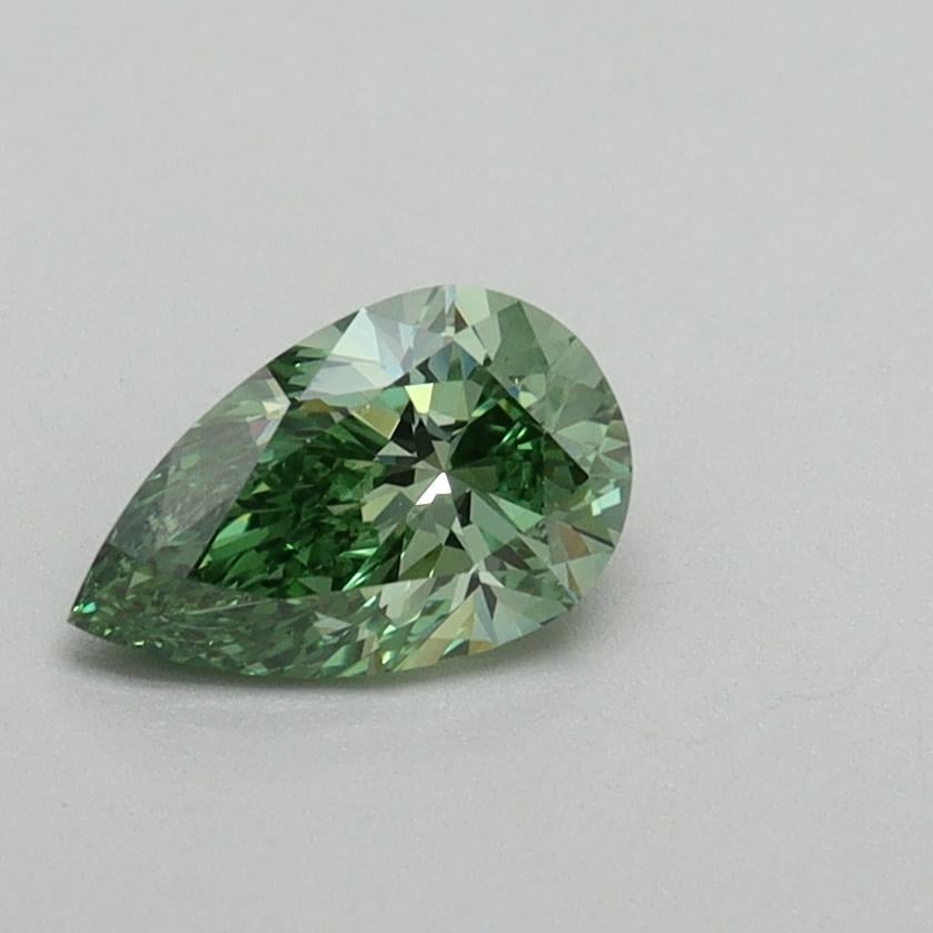 0.55 Ct. Fancy Vivid Pacific Green Pear Lab Grown Diamond