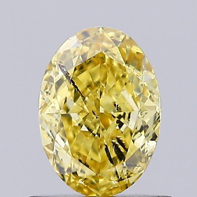 0.71 Ct. Fancy Vivid Yellow Oval Lab Grown Diamond