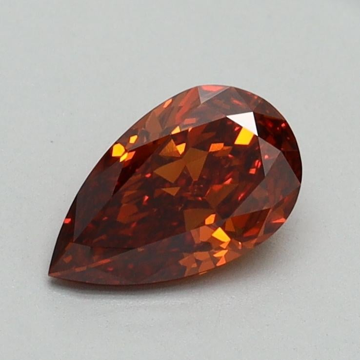0.72 Ct. Fancy Vivid Orange Pear Lab Grown Diamond