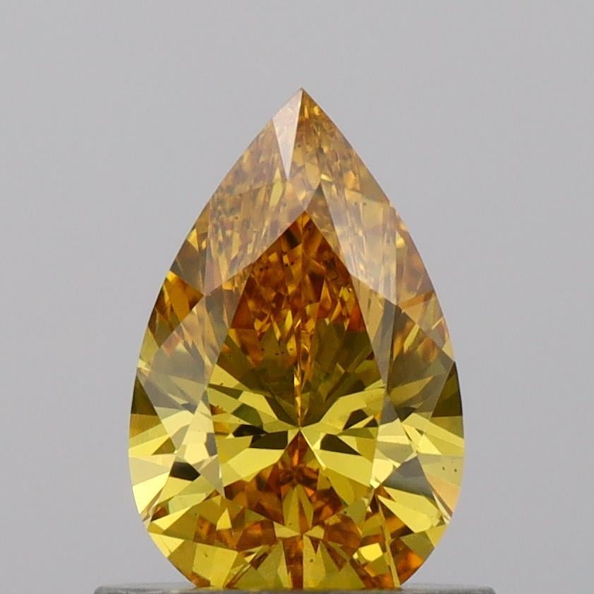 0.70 Ct. Fancy Vivid Orangy Yellow Pear Lab Grown Diamond