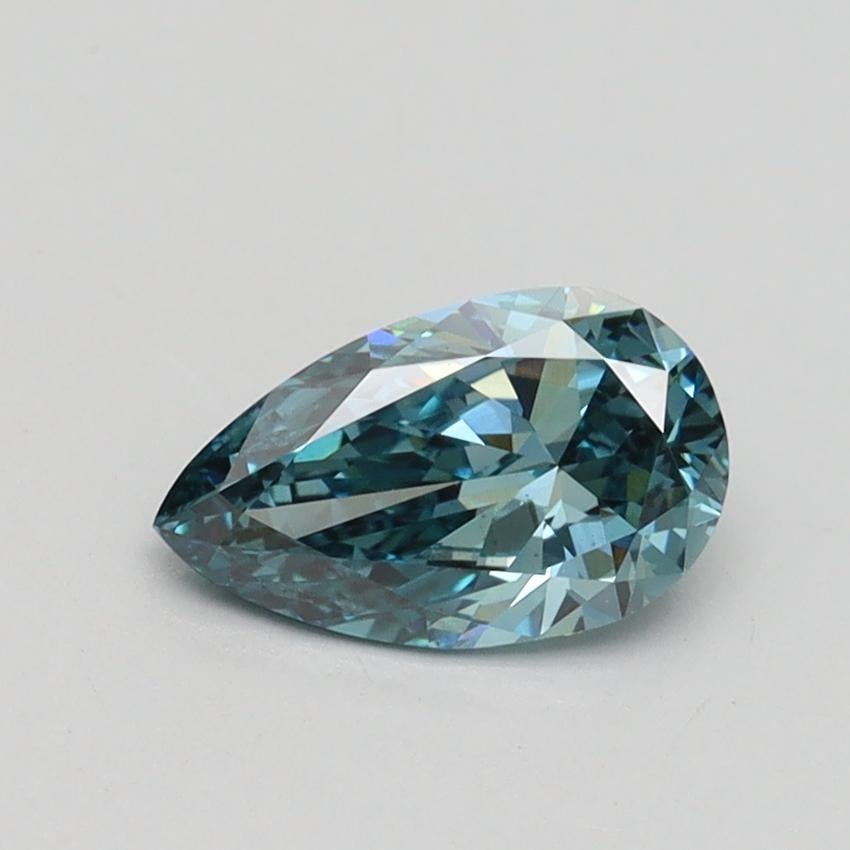 0.71 Ct. Fancy Vivid Greenish Blue Pear Lab Grown Diamond
