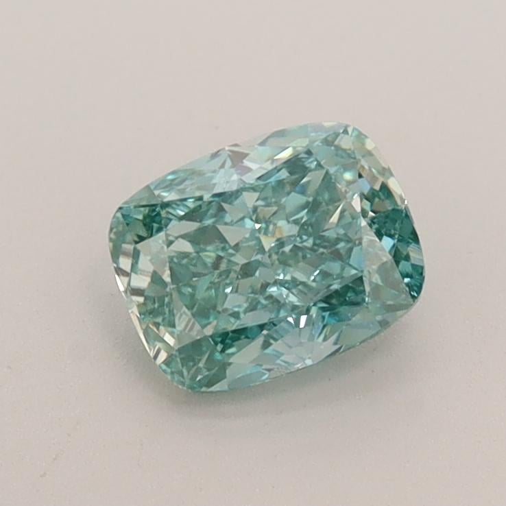 0.69 Ct. Fancy Vivid Bluish Green Cushion Lab Grown Diamond