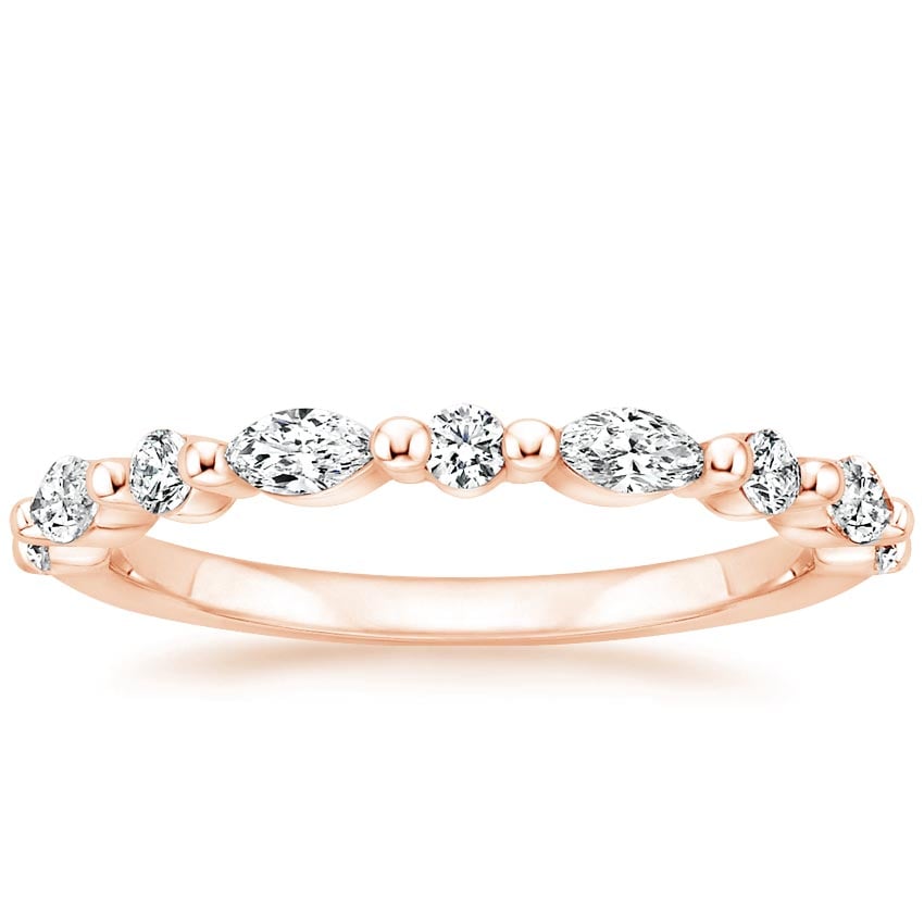 Rose gold diamond engagement ring with surprise diamond details