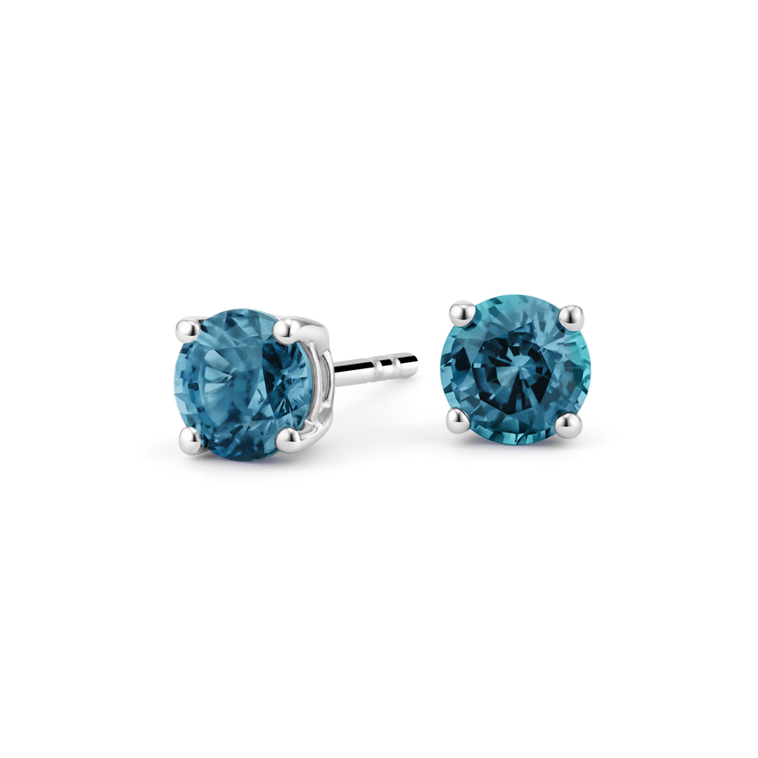 silver earrings with blue topaz