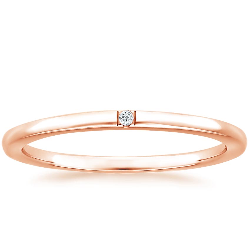 Rose gold diamond engagement ring with surprise diamond details