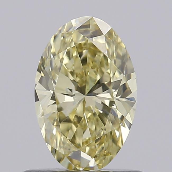 0.65 Ct. Fancy Light Yellow Oval Lab Grown Diamond