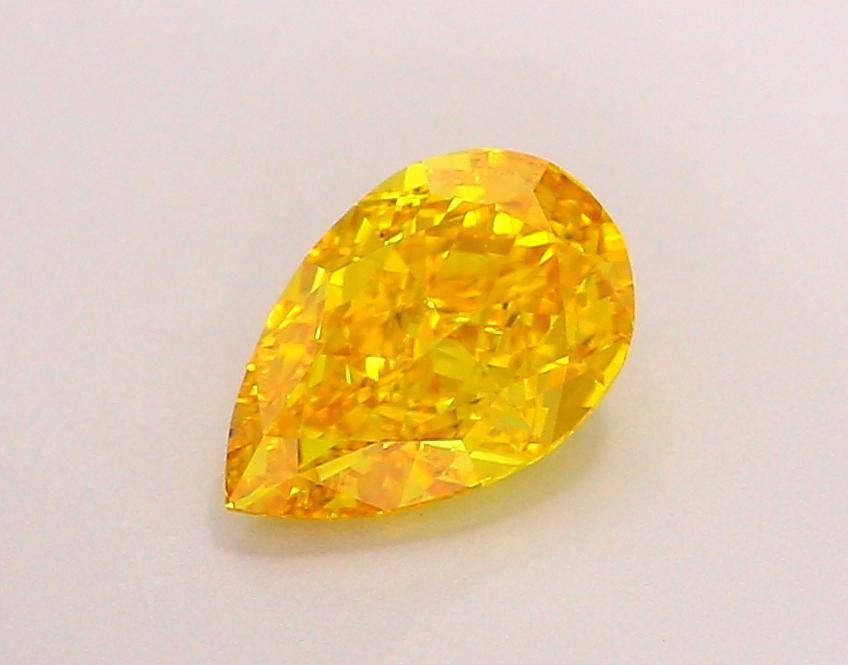 1.06 Ct. Fancy Vivid Orangy Yellow Pear Lab Grown Diamond