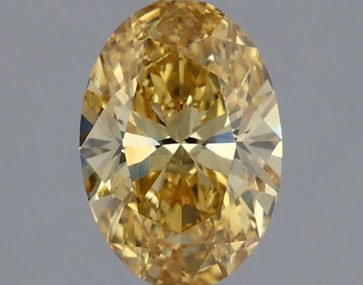 0.54 Ct. Fancy Vivid Yellow Oval Lab Grown Diamond
