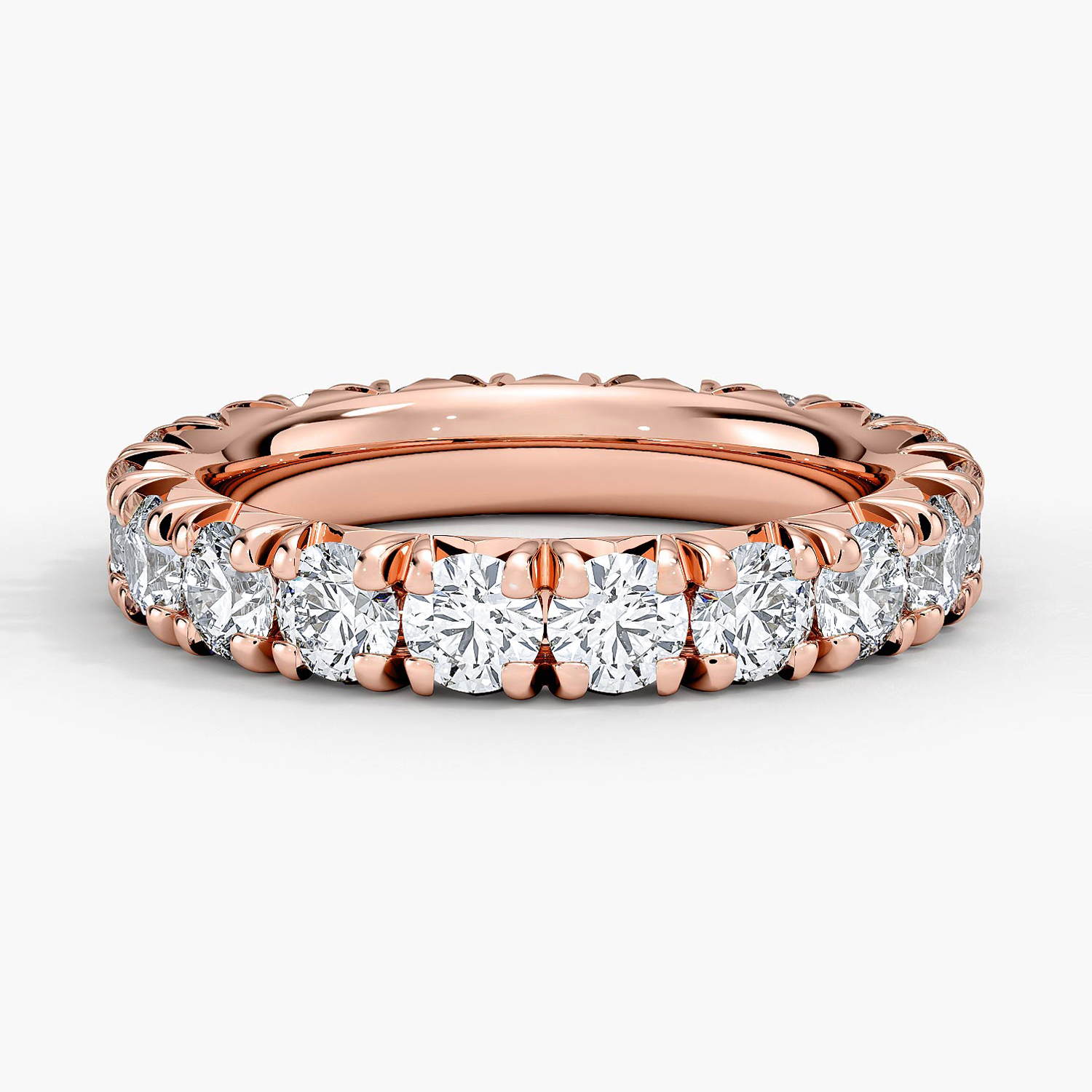 Rose gold diamond engagement ring with surprise diamond details