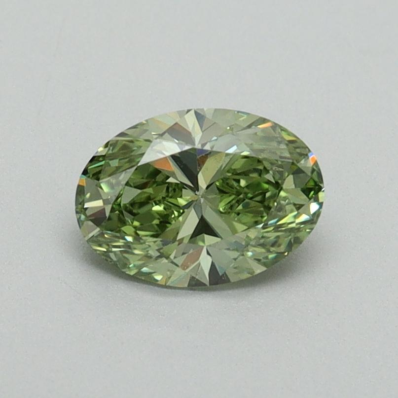 0.67 Ct. Fancy Vivid Green Oval Lab Grown Diamond