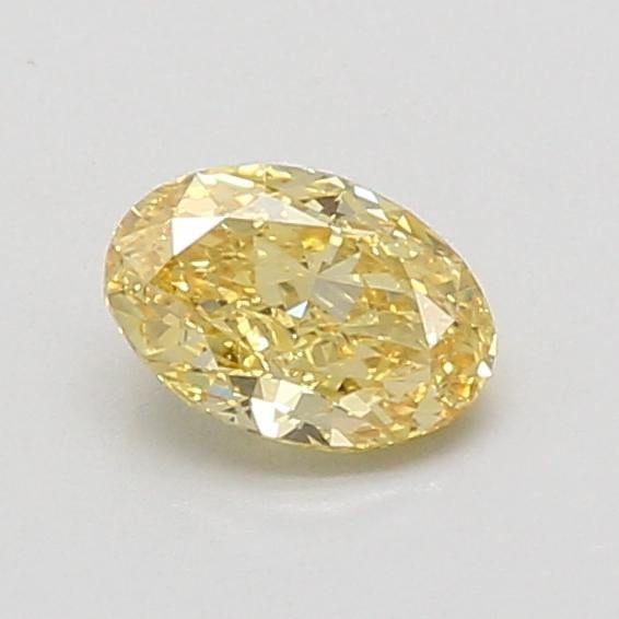 0.61 Ct. Fancy Vivid Yellow Oval Lab Grown Diamond