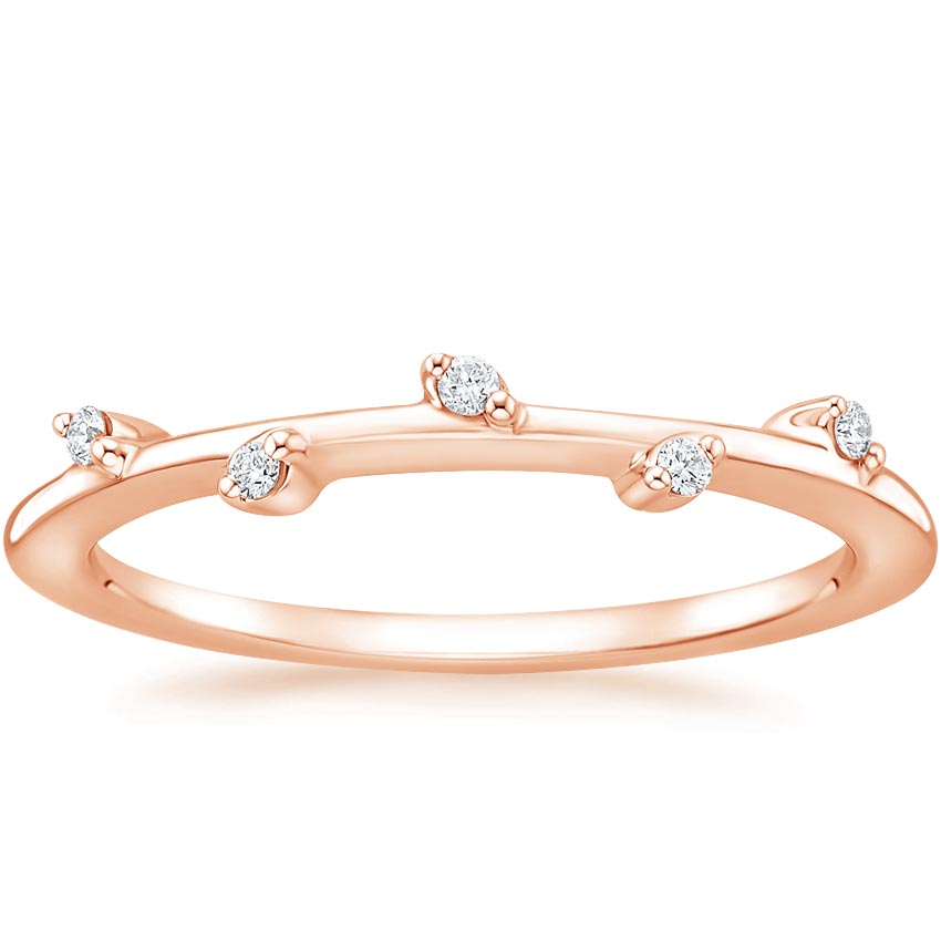 Rose gold diamond engagement ring with surprise diamond details