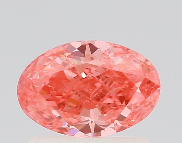 0.77 Ct. Fancy Vivid Pink Oval Lab Grown Diamond