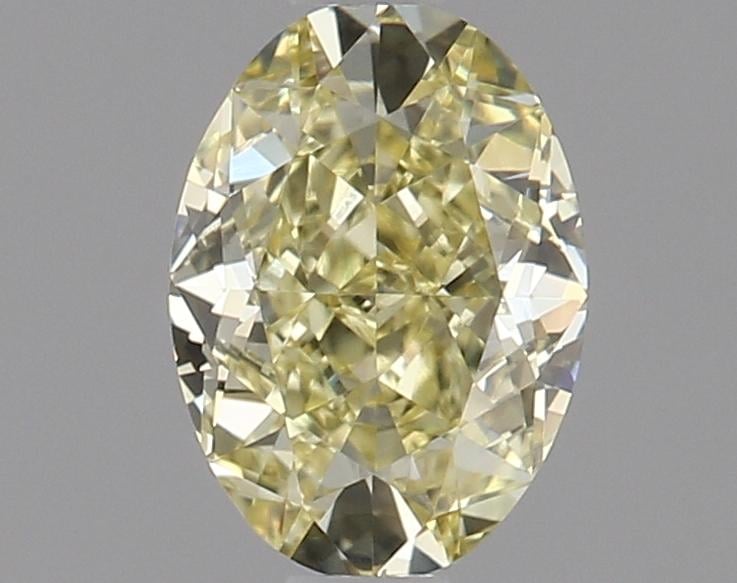 0.71 Ct. Fancy Intense Yellow Oval Diamond