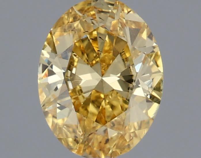 0.52 Ct. Fancy Vivid Yellow Oval Lab Grown Diamond